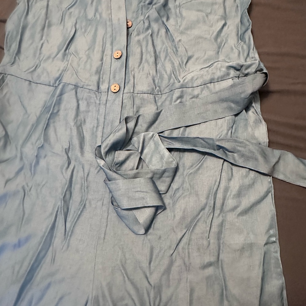 Blue Jean colored button/tie jump suit! Brand new